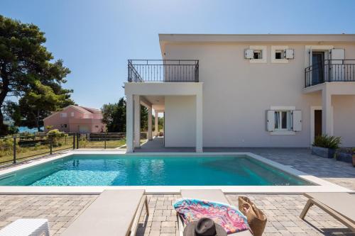 Beachfront villa Pensa private pool, 3-bedroom