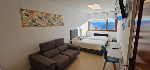 Postel nebo postele na pokoji v ubytování Hotel Artxanda Bilbao, Parking Gratuito en el Exterior Junto al Hotel