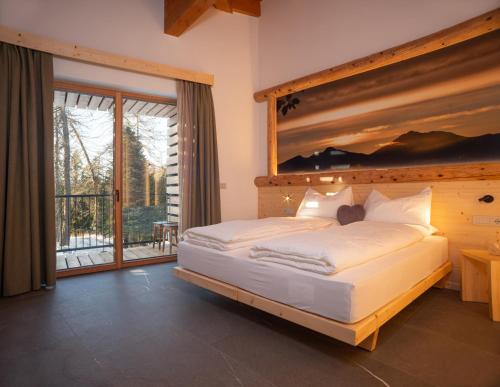 Postel nebo postele na pokoji v ubytování Residence Lavina