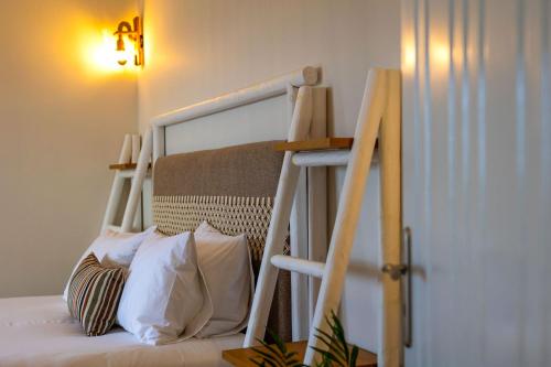 Una cama o camas en una habitación de Sahara Beach Apartments - Kastraki