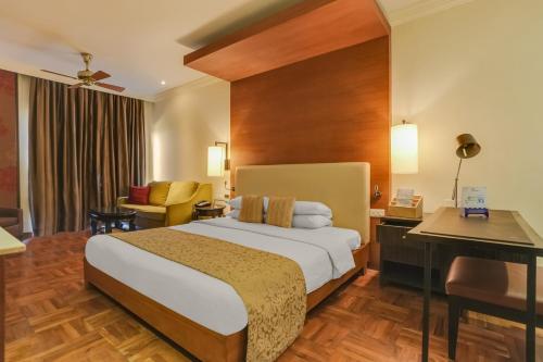 Katil atau katil-katil dalam bilik di Club Mahindra Tungi, Lonavala