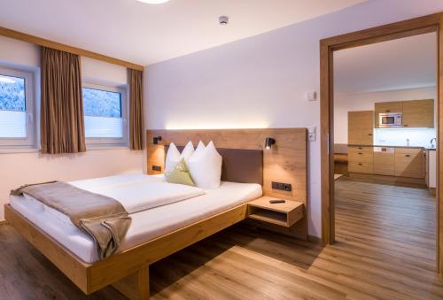 Ein Bett oder Betten in einem Zimmer der Unterkunft Haus Bstieler