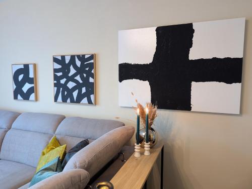 Posezení v ubytování Moderne Wohnung mit Seeblick