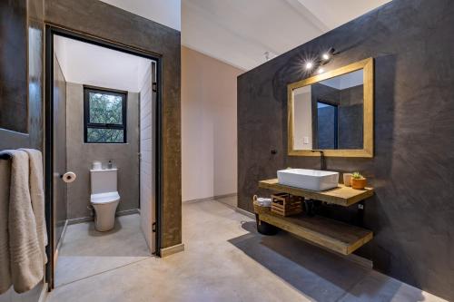 Ένα μπάνιο στο 444 on Taaibos Bush Villa