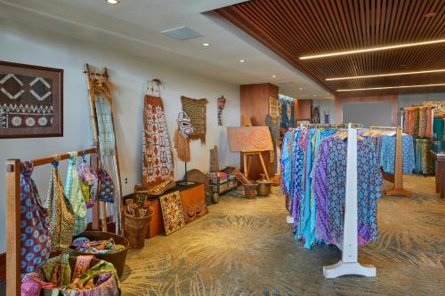 a store with many different types of clothing on display at Mauna Kea Beach Hotel, Autograph Collection in Hapuna Beach