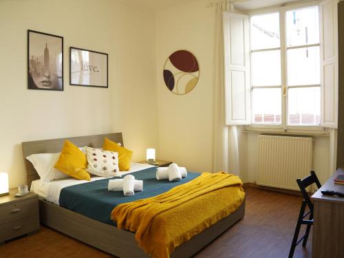 En eller flere senge i et værelse på Charming Home in Termini