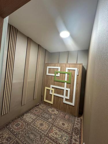 a room with a door and a rug on the floor at Mountain View - Ski in Ski out - Bjelašnica in Bjelašnica