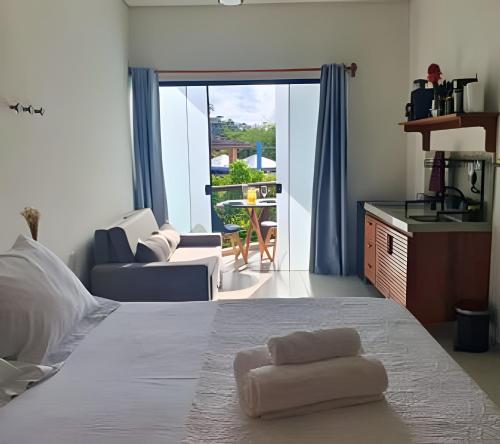 Ένα ή περισσότερα κρεβάτια σε δωμάτιο στο Residencial Mirante