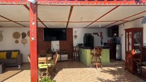 Телевизор и/или развлекательный центр в Casa de Campo Nerys