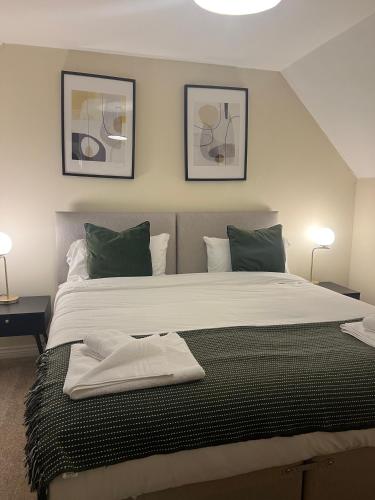 Postel nebo postele na pokoji v ubytování Grange Luxe 4