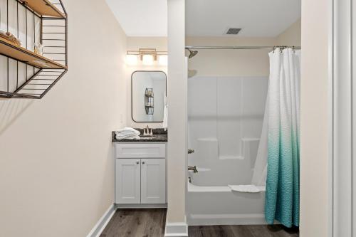 a bathroom with a shower and a sink at Heated Pool & Pet Friendly - Minutes To Beach - Spacious Backyard - FLPCB38 in Panama City Beach
