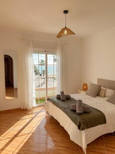 Postel nebo postele na pokoji v ubytování Sea Apartment Cala de Mijas