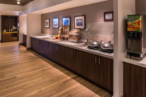 a kitchen with a counter with pots and pans at Fairfield Inn Las Vegas Convention Center in Las Vegas