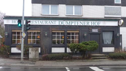 a building with a sign that reads assistant departmentunker hog at Hotel Dümptener Hof in Mülheim an der Ruhr
