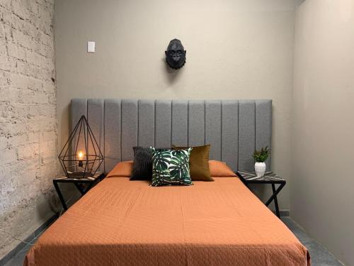 Postel nebo postele na pokoji v ubytování Begonias Loft a 5 Min Del Auditorio Telmex