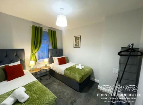 Ένα ή περισσότερα κρεβάτια σε δωμάτιο στο Jackson St by Prestige Properties SA