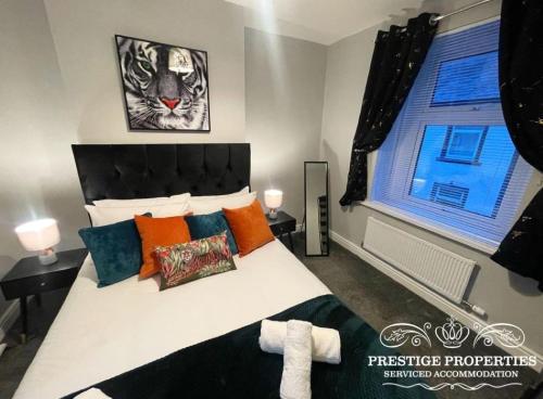 Ένα ή περισσότερα κρεβάτια σε δωμάτιο στο Jackson St by Prestige Properties SA
