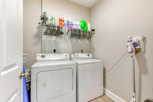 a laundry room with two washing machines and a sink at Near Shopping and Dining Pet-Friendly Dallas Apt! in Gastonia