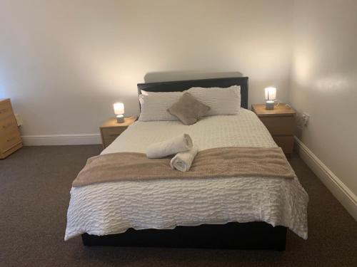 Katil atau katil-katil dalam bilik di A greater graced flat near king power stadium ,tigers rugby stadium &LRI hospital