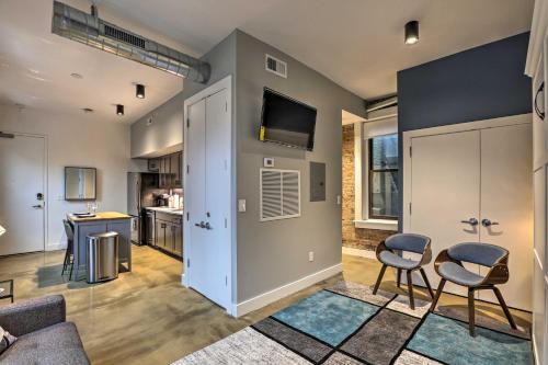 a living room with a couch and two chairs at Sleek Studio Near Dtwn Dining and Entertainment in Cincinnati