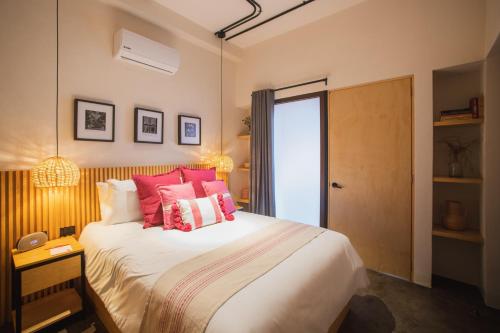 Ένα ή περισσότερα κρεβάτια σε δωμάτιο στο Casa Rosamate