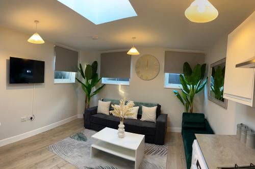 Et tv og/eller underholdning på Flat 4 Folkestone Harbour Luxury Apartment