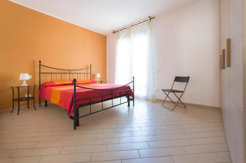 Ένα ή περισσότερα κρεβάτια σε δωμάτιο στο Residence Serenella