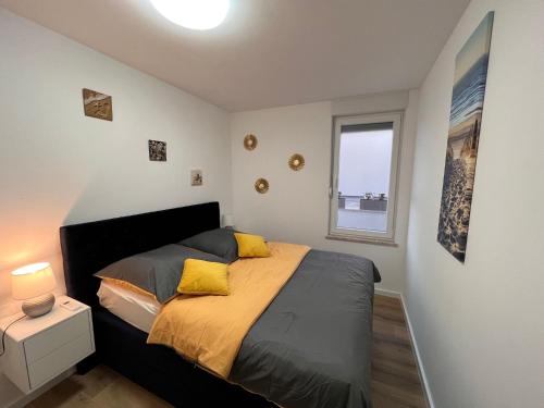 Posteľ alebo postele v izbe v ubytovaní Sunshine Deluxe 79m2 apartment with pool, 50 m2 garden lounge and outdoor space