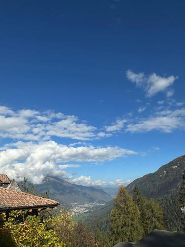a view of the mountains from a house at Kymera Alpine Apartment in Folgarida