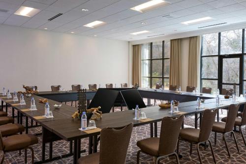 a large conference room with a long table and chairs at Renaissance Austin Hotel in Austin