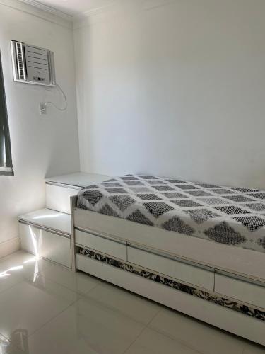 Ένα ή περισσότερα κρεβάτια σε δωμάτιο στο Vida Bela Residence