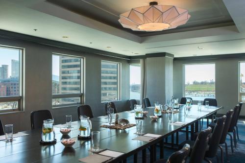 a large conference room with a long table and chairs at Renaissance Baltimore Harborplace Hotel in Baltimore