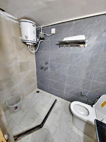 Koupelna v ubytování HR Inn Hotel