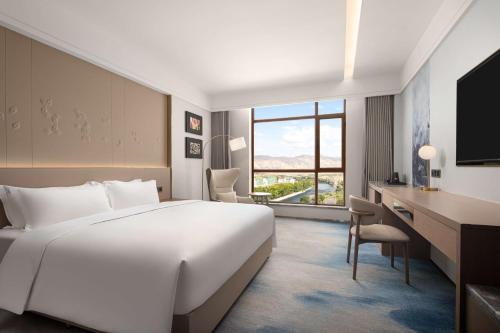 Katil atau katil-katil dalam bilik di Doubletree By Hilton Altay Fuyun