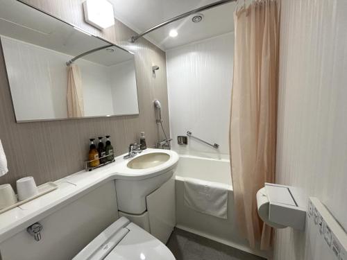 Ένα μπάνιο στο Hotel 1-2-3 Kurashiki