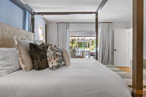 Ένα ή περισσότερα κρεβάτια σε δωμάτιο στο Villa Luz Plantation