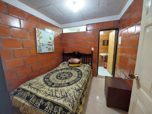 Hospedaje El Frescoにあるベッド