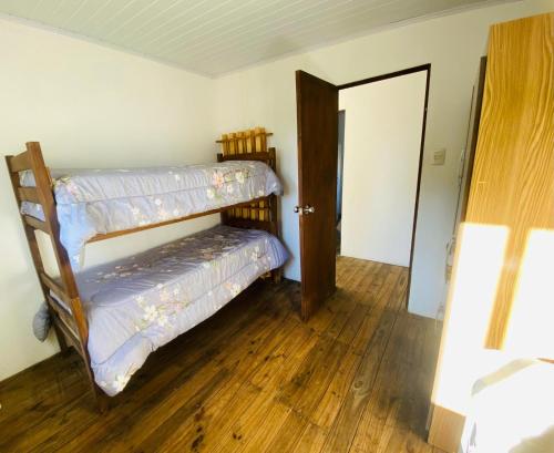 Ένα ή περισσότερα κρεβάτια σε δωμάτιο στο Desconectar para Conectar