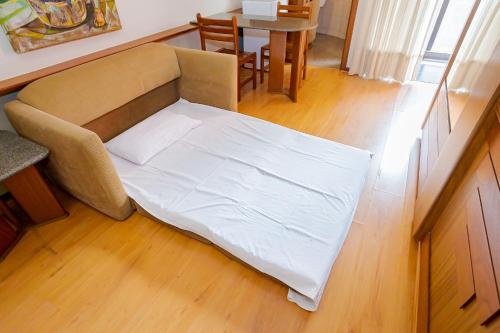 Postel nebo postele na pokoji v ubytování Batel Residence | Avenida do Batel | Gonzaga Stays