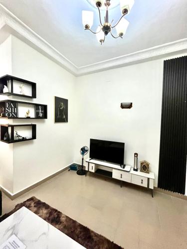 TV a/nebo společenská místnost v ubytování Essentiel 2