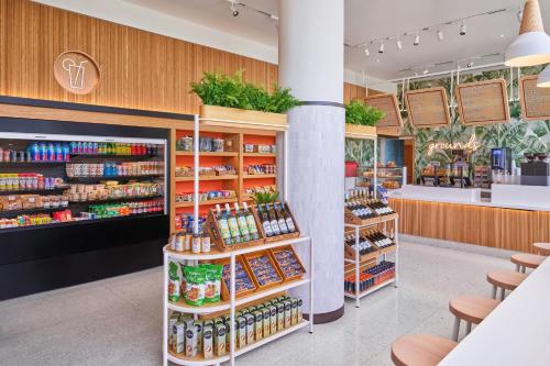 a grocery store with a lot of products on display at Walt Disney World Swan Reserve in Orlando