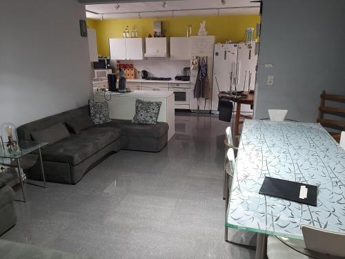 a living room with a couch and a table at Superb vacancy at Patricks house in Ketzingen