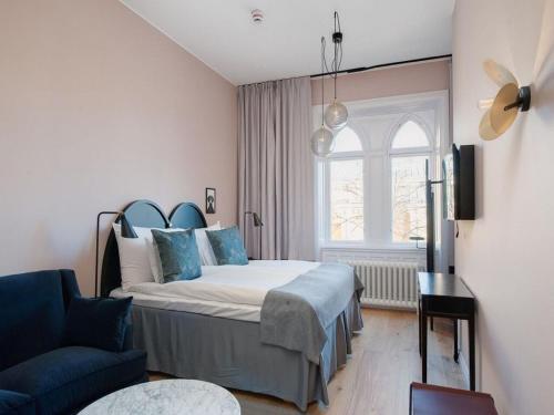 Katil atau katil-katil dalam bilik di Clarion Collection Hotel Borgen