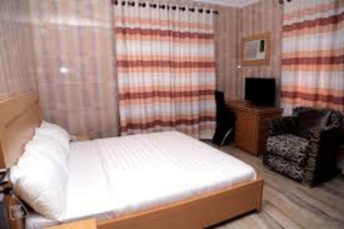 Ένα ή περισσότερα κρεβάτια σε δωμάτιο στο Dilida Guest Suites-standard