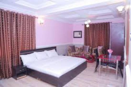 Ένα ή περισσότερα κρεβάτια σε δωμάτιο στο Dilida Guest Suites-standard