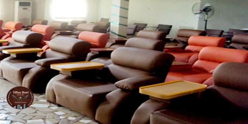 a room filled with lots of different colored chairs at Tiffany Hotels and Towers in Imogwu-Agwa