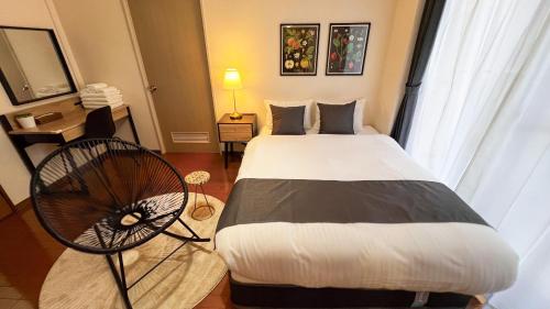 Ένα ή περισσότερα κρεβάτια σε δωμάτιο στο OUCHI HOTEL Kawaramachi