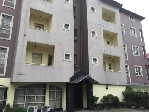 an external view of an apartment building at Christine Hotel - Christine Monarch in Port Harcourt