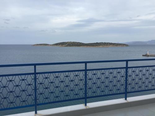 a view of the ocean from a bridge at Angelos Hotel in Agios Nikolaos