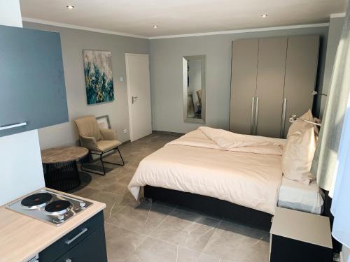 Ένα ή περισσότερα κρεβάτια σε δωμάτιο στο Boardinghouse 23